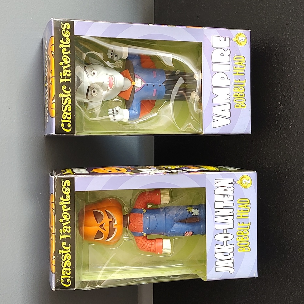 Two vintage Halloween bobbleheads